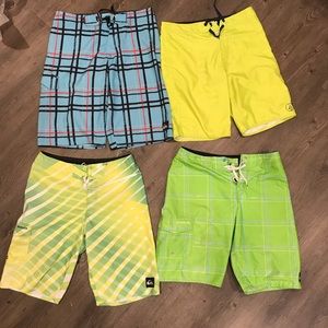 Lot of 4 Quicksilver volcom board shorts size 28